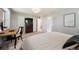 Cozy bedroom featuring a dedicated workspace, providing a comfortable and productive environment at 2813 Central Park Blvd, Denver, CO 80238