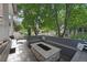 Outdoor patio area with built-in seating and a fire pit at 2813 Central Park Blvd, Denver, CO 80238