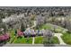 A grand home and grounds set in a scenic, wooded neighborhood at 21 Huntwick Ln, Cherry Hills Village, CO 80113