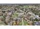 Beautiful aerial view showcasing property with lush surroundings at 21 Huntwick Ln, Cherry Hills Village, CO 80113
