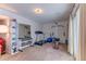 Home gym features mirrored wall, free weights, and workout equipment at 23495 Bluestem Dr, Golden, CO 80401
