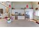 Modern kitchen with stainless steel appliances and white cabinetry at 23495 Bluestem Dr, Golden, CO 80401