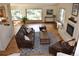 Inviting living room with hardwood floors, fireplace and large picture window at 23495 Bluestem Dr, Golden, CO 80401
