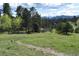 Scenic walking path through open green space at 23495 Bluestem Dr, Golden, CO 80401
