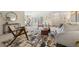 Charming living room featuring seamless flow into the adjacent dining room at 3942 E Evans Ave, Denver, CO 80210