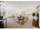Open-concept living space with fireplace and lots of room for activities at 3942 E Evans Ave, Denver, CO 80210
