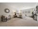 Spacious main bedroom featuring hardwood floors, with a large area rug, and neutral colored walls at 3942 E Evans Ave, Denver, CO 80210