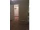 View of a bedroom leading to a walk-in closet and an attached bathroom at 2281 S Vaughn Way # 118A, Aurora, CO 80014