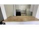 Kitchen with essential appliances and countertop at 2281 S Vaughn Way # 118A, Aurora, CO 80014