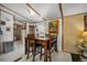 Cozy dining room area featuring wooden dining set with modern decor at 422 Willow Dr, Lochbuie, CO 80603
