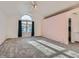 Spacious bedroom with vaulted ceilings, natural light, and carpeted floor at 17045 Hastings Ave, Parker, CO 80134