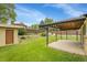 Charming backyard with covered patio and shed, ideal for relaxing or entertaining in a private setting at 3444 S Bellaire St, Denver, CO 80222