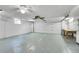 Spacious two-car garage with ample room for parking and storage with workbench at 3444 S Bellaire St, Denver, CO 80222