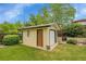 Detached single-car garage providing secure parking and additional storage space at 3444 S Bellaire St, Denver, CO 80222