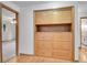 Hallway with built-in storage cabinets and drawers at 3444 S Bellaire St, Denver, CO 80222