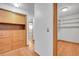 Hallway with built-in storage, connecting to other rooms at 3444 S Bellaire St, Denver, CO 80222