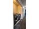 Laundry room with side-by-side washer and dryer on carpet at 3611 S Perth Cir # 103, Aurora, CO 80013