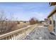 Wooden deck with scenic views of the surrounding area and a glimpse of the neighbor's house at 25843 E Archer Dr, Aurora, CO 80018