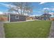 Spacious backyard features a shed, well-manicured lawn, and privacy fence at 18866 W 59Th Pl, Golden, CO 80403