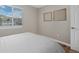 Basic bedroom featuring a window with blinds at 18866 W 59Th Pl, Golden, CO 80403