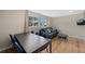 Inviting living room with wood floors, a comfortable couch, and large windows offering plenty of natural light at 18866 W 59Th Pl, Golden, CO 80403