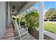Cozy front porch with rocking chairs, perfect for relaxing outdoors at 2608 E Fremont Pl, Centennial, CO 80122