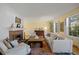Inviting living room with a classic fireplace and hardwood floors at 2608 E Fremont Pl, Centennial, CO 80122
