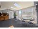 Relaxing sunroom featuring abundant natural light, comfortable seating, and stylish decor at 2608 E Fremont Pl, Centennial, CO 80122