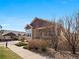 Inviting exterior showcasing the home's architecture, landscaping, and neighborhood setting at 19795 W 57Th Ave, Golden, CO 80403