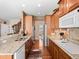 Well-lit kitchen featuring granite countertops, stainless steel appliances, and ample cabinet space at 19795 W 57Th Ave, Golden, CO 80403