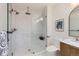Modern bathroom featuring walk-in shower, stylish tile work, and contemporary design at 853 Saint Paul St, Denver, CO 80206