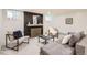Cozy living room with fireplace and a comfortable seating area, perfect for relaxation at 853 Saint Paul St, Denver, CO 80206