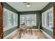 Inviting office features natural light and green painted walls, creating a calming workspace at 853 Saint Paul St, Denver, CO 80206