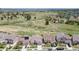 This aerial view showcases the community's proximity to open green spaces, trails, and other homes in a picturesque setting at 11890 Discovery Cir, Parker, CO 80138