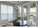 Cozy breakfast nook with views of the outdoor patio and landscaping at 11890 Discovery Cir, Parker, CO 80138