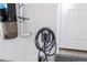 Utility area with wall mounted vacuum and charger at 11890 Discovery Cir, Parker, CO 80138