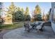 Landscaped backyard with mature trees and a nice deck at 4530 Ridgewood Ct, Castle Rock, CO 80109