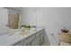 Neutral tones enhance this well-lit bathroom, ready for your decor at 4530 Ridgewood Ct, Castle Rock, CO 80109