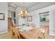 Charming dining area with a chandelier, a view of the staircase, and a cozy atmosphere for Gathering meals at 4530 Ridgewood Ct, Castle Rock, CO 80109