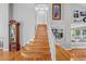 Inviting entryway with hardwood floors, staircase and decorative accents leading to the living area at 4530 Ridgewood Ct, Castle Rock, CO 80109