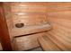 The interior of this sauna features wooden benches and walls at 8130 E Bethany Pl, Denver, CO 80231