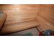 Inviting sauna room features natural wood paneling on walls and ceiling and a comfortable built-in bench at 8130 E Bethany Pl, Denver, CO 80231