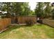 Backyard features a utility shed with wooden exterior and a well-kept yard at 8130 E Bethany Pl, Denver, CO 80231