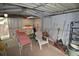 The interior of the backyard utility shed showing space for storage or a workshop at 8130 E Bethany Pl, Denver, CO 80231