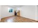 Finished basement with wood floors features a work desk, office space and a window with light at 12828 Fox Ct, Westminster, CO 80234