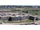 Well-maintained brick building with a large parking lot and green spaces at 12828 Fox Ct, Westminster, CO 80234