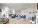Spacious living room connects to the kitchen, providing ample space for entertaining at 12828 Fox Ct, Westminster, CO 80234
