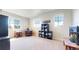 Upstairs bonus room with two large windows offering lots of natural light at 12828 Fox Ct, Westminster, CO 80234