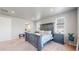 Calm primary bedroom featuring plenty of space, with a doorway to the bathroom at 12828 Fox Ct, Westminster, CO 80234