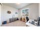 Bright office space with window, desk, and guitars, perfect for working from home at 12828 Fox Ct, Westminster, CO 80234